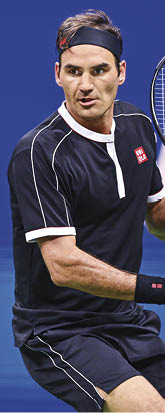 September 3, 2019 - Roger Federer in action against Grigor Dimitrov in a quarterfinal match at the 2019 US Open. (Photo by Fernando Colon/USTA)