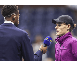 NEW YORK, NEW YORK - SEPTEMBER 02: ESPN Commentator Christopher Eubanks interviews Jannik Sinner of Italy after he defeated Tommy Paul of the United States during their Men's Singles Fourth Round match on Day Eight of the 2024 US Open at USTA Billie Jean King National Tennis Center on September 02, 2024 in the Flushing neighborhood of the Queens borough of New York City. (Photo by Jamie Squire/Getty Images)