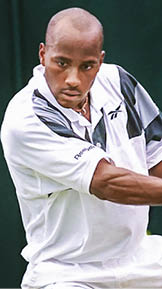 WIMBLEDON, UNITED KINGDOM - JULY 2: Malivai  Washington of the US returns a two-handed backhand to his opponent Paul Haarhuis of the Netherlands during their fourth round match at the Wimbledon Tennis Championships 02 July. Washington defeated Haarhuis 6-3, 6-4, 6-2. AFP PHOTO Jean-Loup GAUTREAU  (Photo credit should read JEAN-LOUP GAUTREAU/AFP via Getty Images)