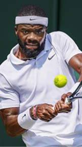 LONDON, ENGLAND - JULY 02: Frances Tiafoe of USA plays a backhand shot during their Gentlemen's Singles Third Round match against Karen Khachanov of Russia during Day Five of The Championships - Wimbledon 2021 at All England Lawn Tennis and Croquet Club on July 02, 2021 in London, England. (Photo by Alastair Grant - Pool/Getty Images)