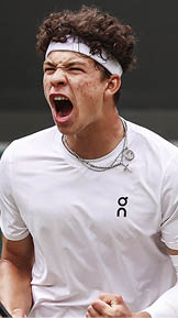USA's Ben Shelton reacts after breaking hte serve of Canada's Denis Shapovalov in the third set during their men's singles tennis match on the sixth day of the 2024 Wimbledon Championships at The All England Lawn Tennis and Croquet Club in Wimbledon, southwest London, on July 6, 2024. (Photo by HENRY NICHOLLS / AFP) / RESTRICTED TO EDITORIAL USE (Photo by HENRY NICHOLLS/AFP via Getty Images)
