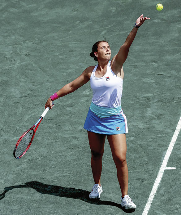 CHARLESTON, SOUTH CAROLINA - APRIL 04: Emma Navarro serves to Madison Keys during the Credit One Charleston Open at Credit One Stadium on April 04, 2023 in Charleston, South Carolina. (Photo by Matthew Stockman/Getty Images)