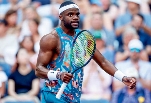 NEW YORK, NEW YORK - SEPTEMBER 03: Frances Tiafoe of the United States reacts against Rinky Hijikata of Australia during their Men's Singles Fourth Round match on Day Seven of the 2023 US Open at the USTA Billie Jean King National Tennis Center on September 03, 2023 in the Flushing neighborhood of the Queens borough of New York City. (Photo by Sarah Stier/Getty Images)