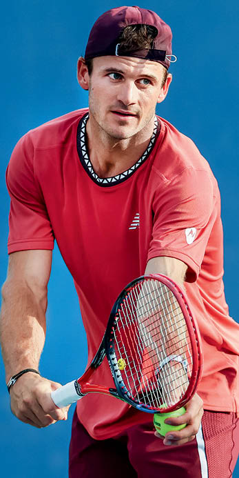 NEW YORK, NEW YORK - AUGUST 30: Tommy Paul of the United States serves against Roman Safiullin of Russia during their Men's Singles Second Round match on Day Three of the 2023 US Open at the USTA Billie Jean King National Tennis Center on August 30, 2023 in the Flushing neighborhood of the Queens borough of New York City. (Photo by Matthew Stockman/Getty Images)