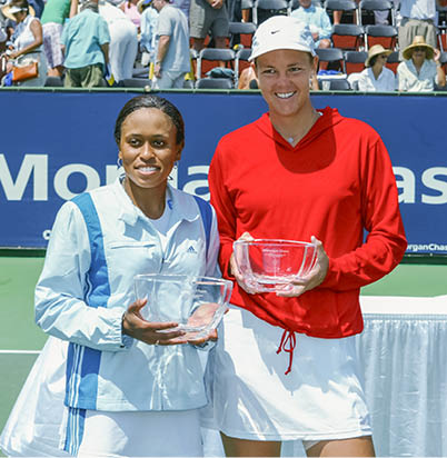 MANHATTAN BEACH, CA - AUGUST 11: Chandra Rubin (USA) (left) and Lindsay Davenport (USA) (right) pose with their trophies after the final round of the JPMorgan Chase Open on August 11, 2002 at the Manhattan Country Club in Manhattan Beach, California.  Rubin defeated Davenport 5-7, 7-6 (5), 6-3.  (Photo by Jeff Gross/Getty Images)