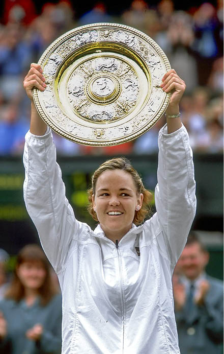 4 Jul 1999: Lindsay Davenport of the United States proudly lifts the trophy after winning the Wimbledon Ladies Singles Championship Final match against Steffi Graf of Germany played at the All England Club in Wimbledon, England.    Lindsay Davenport wonthe match in straight sets 6-4, 7-5 and this prompted Steffi Graf to retire from Wimbledon. \ Mandatory Credit: Gary M Prior/Allsport