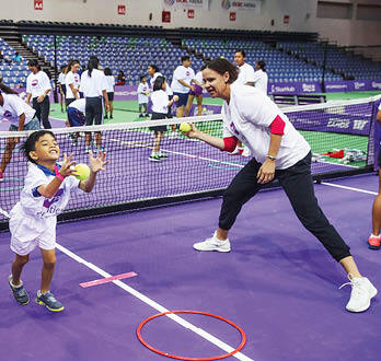 SINGAPORE - OCTOBER 21: WTA Finals Legend Ambassador Lindsay Davenport of the United States takes part during Community Day prior to the BNP Paribas WTA Finals Singapore presented by SC Global at OCBC Arena on October 21, 2017 in Singapore.  (Photo by Julian Finney/Getty Images for WTA)
