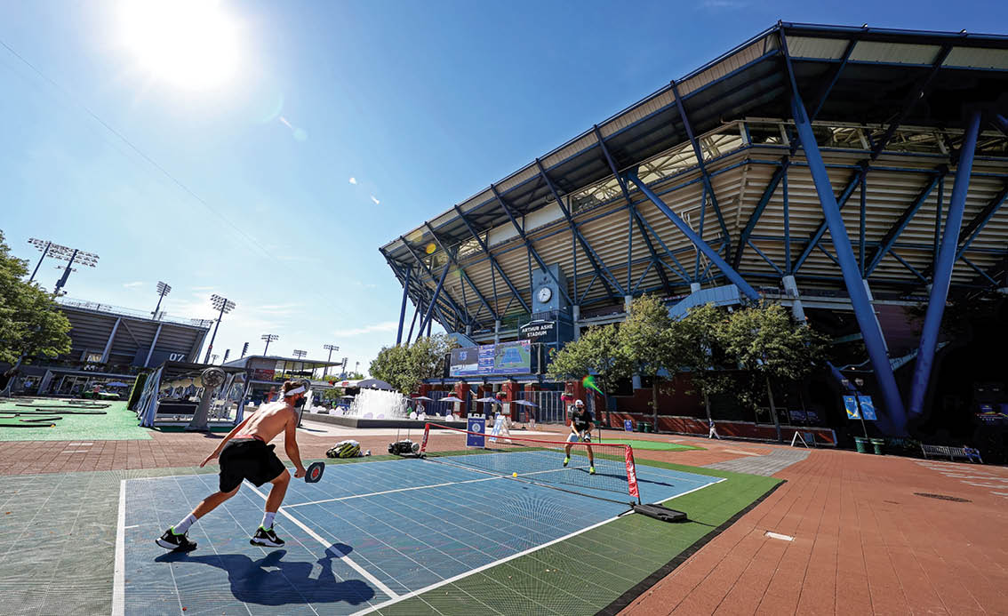 NEW YORK, NEW YORK - SEPTEMBER 04: Jack Sock (R) of the United States warms up against his coach Alex Bogomolov (L) in a recreational game of Pickleball outside of Arthur Ashe Stadium on Day Five of the 2020 US Open at USTA Billie Jean King National Tennis Center on September 04, 2020 in the Queens borough of New York City. (Photo by Al Bello/Getty Images)