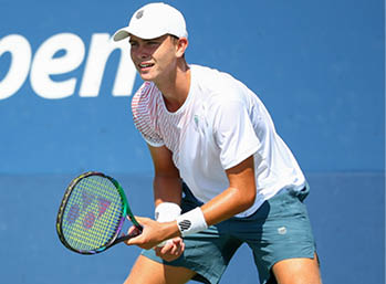 Cooper Woestendick in action during a junior boys' singles match at the 2023 US Open, Sunday, Sep. 3, 2023 in Flushing, NY. (David Nemec/USTA)