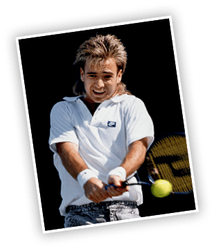 Andre Agassi of the United States wearing his jean style shorts makes a double hand return during a Men's Singles match at the ATP Lipton Tennis Championship on 15th March 1988 at the Tennis Center at Crandon Park in Key Biscayne, Florida, United States (Photo by Bob Martin/Getty Images) 